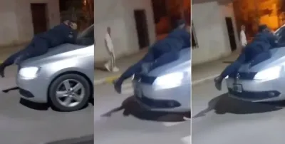 Un conductor alcoholizado arrastró 20 cuadras a un policía en el capot del auto: el video